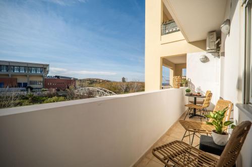 Ammoutsiani 2 Apt with Parking by 8essentially