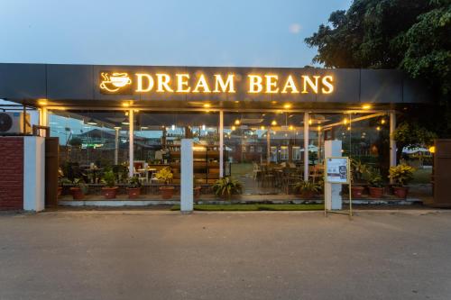 a dream beans store with a sign on the front at Dreamland Gold Resort & Hotel in Bhairāhawā