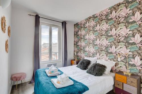 a bedroom with a bed with a large window at 809 Suite Fantastic - Superb apartment in Bagnolet