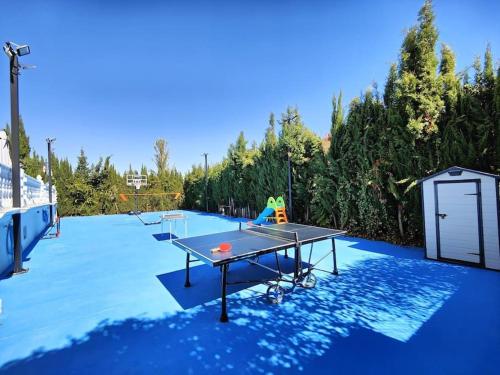 Swimmingpoolen hos eller tæt på Villa Terracota, lujo en Granada y Sierra Nevada