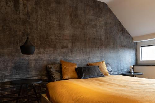 Ένα ή περισσότερα κρεβάτια σε δωμάτιο στο Lunica