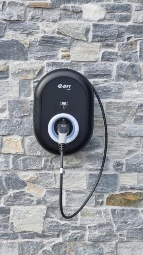 a speaker is attached to a stone wall at Einzigartige Traumwohnung mit Whirlpool & Sauna bietet Luxus und Erholung in Neuheilenbach