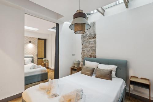 Krevet ili kreveti u jedinici u objektu 142 Suite Ober - Superbe Appartement à Paris