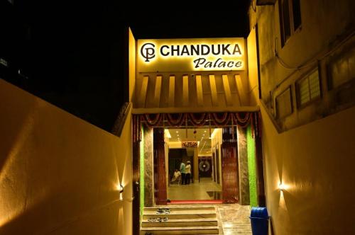 a building with a sign that reads chambula palace at Hotel Chanduka Palace , Puri in Puri