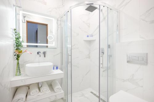 Koupelna v ubytování Leandros Hotel