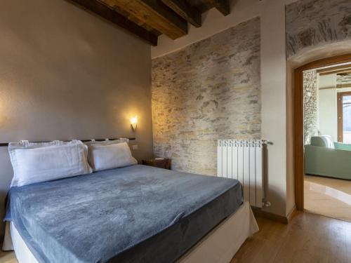 Ένα ή περισσότερα κρεβάτια σε δωμάτιο στο Apartment Il Loggiato by Interhome