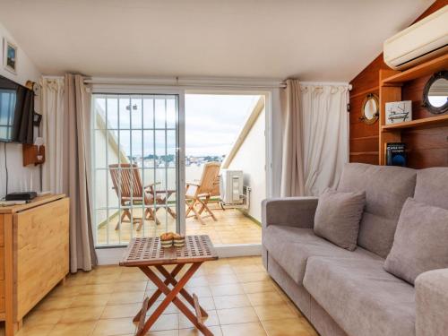 Televízia a/alebo spoločenská miestnosť v ubytovaní Studio Port L'escala-6 by Interhome
