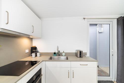 Una cocina o zona de cocina en Little Paradise