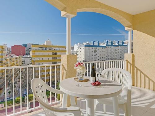 a white table and chairs on a balcony with a view at Apartment Apolo VII-7 by Interhome in Calpe