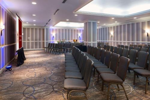 a conference room with chairs and a table in it at DoubleTree by Hilton Jacksonville Riverfront, FL in Jacksonville
