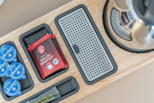 a cell phone sitting on top of a table at Hotel Madeleine in Obergurgl