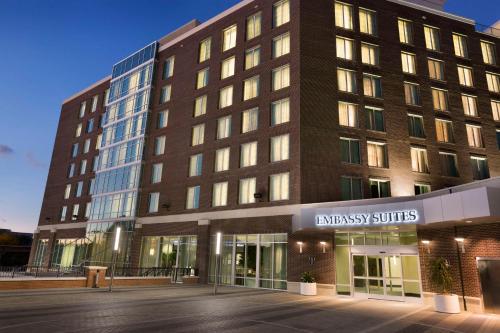 an image of a building with a hospital at Embassy Suites by Hilton Greenville Downtown Riverplace in Greenville