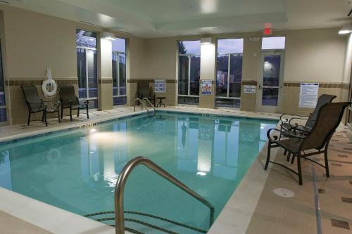 a large swimming pool with chairs at Hampton Inn & Suites Boone, Nc in Boone