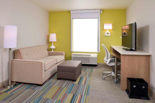 Télévision ou salle de divertissement dans l'établissement Home2 Suites By Hilton Merrillville