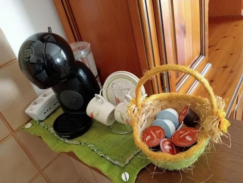 a basket of food and other kitchen items on a counter at Terrazza Rinaldi - centro - wifi - Panoramico in Fanano
