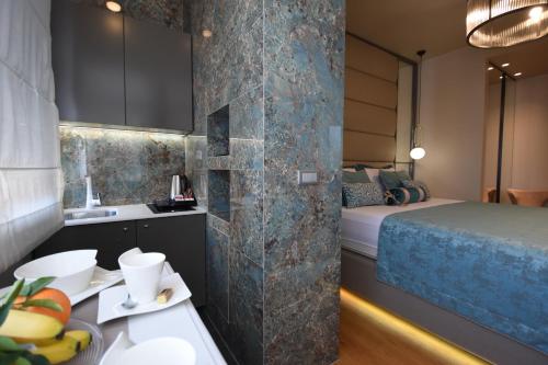 Postel nebo postele na pokoji v ubytování Luxury Rooms Fortuna