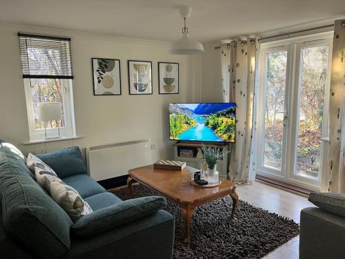 A television and/or entertainment centre at Purfleet Apartment-Free Parking