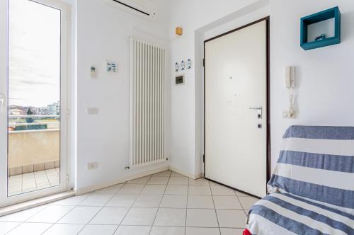 Ένα ή περισσότερα κρεβάτια σε δωμάτιο στο Casa di Oliver-Apt x4 with terrace and parking!