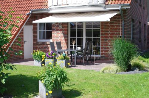 Aed väljaspool majutusasutust Ferienwohnung Schneider