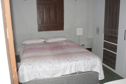 Кровать или кровати в номере Casa c WiFi a beira mar na Praia Redonda,Icapui CE
