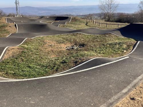 a skate park with a skateboard ramp on a road at Charmant gîte historique avec pêche privée et forêt, près de Brioude et Blesle - FR-1-582-352 in Lorlanges