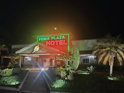 a hotel with a sign that reads fame plaza hotel at Fênix Plaza Hotel in Aquidauana