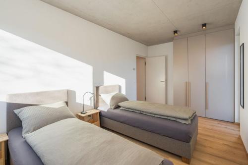 Ένα ή περισσότερα κρεβάτια σε δωμάτιο στο Ferienhaus Obergfillhof