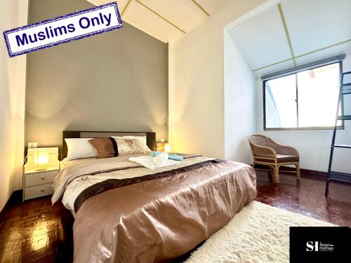 a bedroom with a bed and a sign that reads misfits only at Waves Bliss - Seaside Serenity - 3BR2B 8 pax by Cowidea in Port Dickson