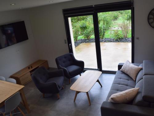 Photo de la galerie de l'établissement Maison confortable avec terrasse dans les Vosges - FR-1-589-328, à Ban-sur-Meurthe-Clefcy