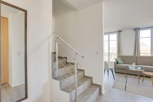 אזור ישיבה ב-157 Suite Sacha - Superb duplex in Paris