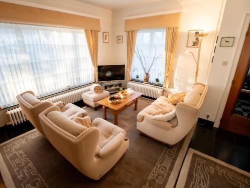 Coin salon dans l'établissement Villa Hamarrbø with garden and parking by Interhome