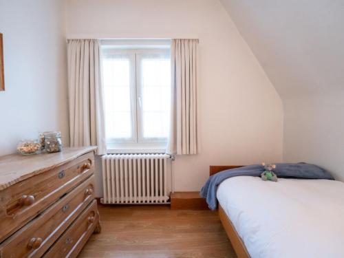 Un ou plusieurs lits dans un hébergement de l'établissement Villa Hamarrbø with garden and parking by Interhome