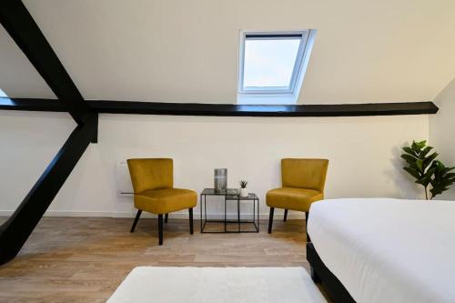 Photo de la galerie de l'établissement NG Prestige - Lille l Tourcoing l Haute - Duplex 4 pers - Balnéo - Netflix - Wifi, à Tourcoing