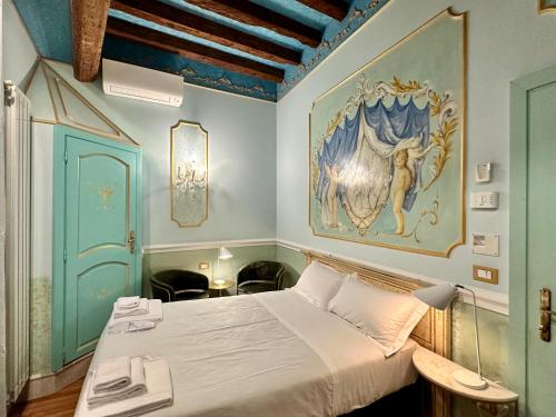 Postel nebo postele na pokoji v ubytování Casa Alla Fenice