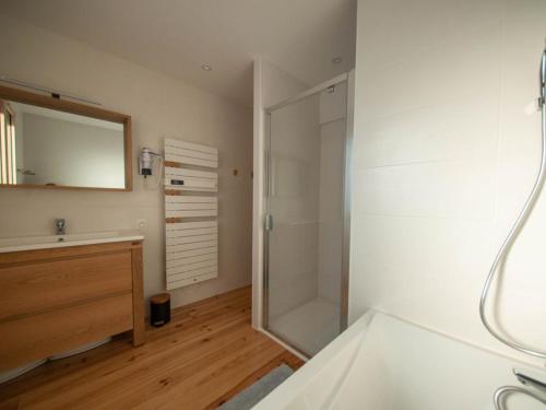 a bathroom with a shower and a sink at Chalet familial spacieux avec SPA, salle de jeux, près des pistes - 14 pers, Vosges - FR-1-589-366 in Ban-sur-Meurthe-Clefcy