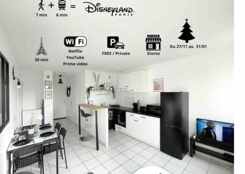 a kitchen with a black refrigerator and a table at Mickey's house - Apartments 4 persons - 10 min Disneyland Paris in Bussy-Saint-Georges