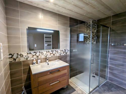 a bathroom with a sink and a shower at Maison spacieuse près de Gérardmer - 4 pers, ski, randos, lac, bébé ok - FR-1-589-374 in Vagney