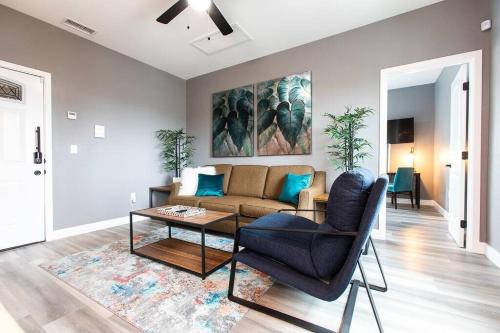 a living room with a couch and a table at Travel-Nurses & Professionals-Stay Close to it All in San Diego