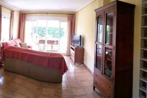 Posedenie v ubytovaní 3 bedrooms villa with shared pool terrace and wifi at Vera 3 km away from the beach