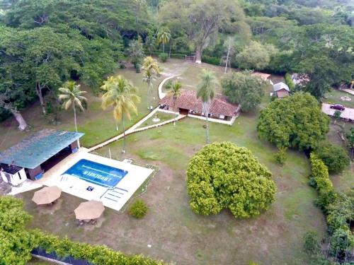 an aerial view of a resort with a swimming pool at Hermosa Finca La Rochela, Santa fe de Antioquia in Santa Fe de Antioquia