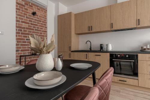 Кухня или мини-кухня в HARBOR APARTMENTS - Mickiewicza
