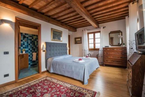 Postel nebo postele na pokoji v ubytování Villa Le Querce by Nicola Real Estate
