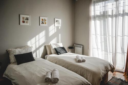 two beds sitting next to each other in a bedroom at Debed Life CoLiving and Retreat in Debed