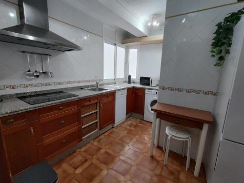 Kuchyň nebo kuchyňský kout v ubytování Precioso apartamento en Sevilla.