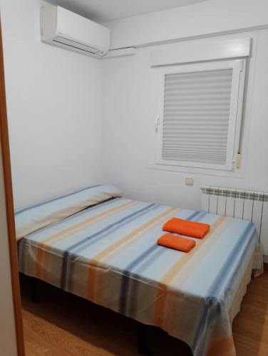 Voodi või voodid majutusasutuse Habitación cerca centro d Madrid toas
