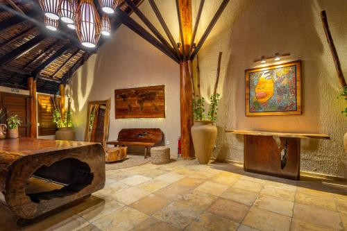 Гостиная зона в Vila Coqueiros Boutique Hotel