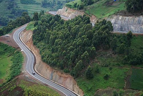 an aerial view of a winding road on a mountain at Bugara Homestay in Kisoro