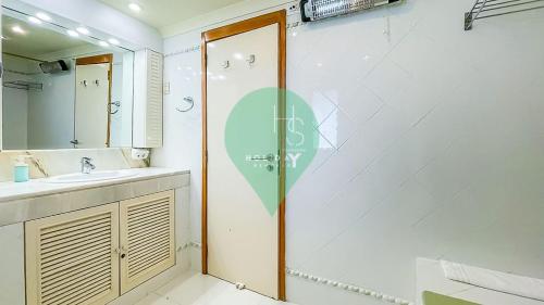 a bathroom with a shower and a sink at YES Vista Marina T1 by HsR Vilamarina in Quarteira