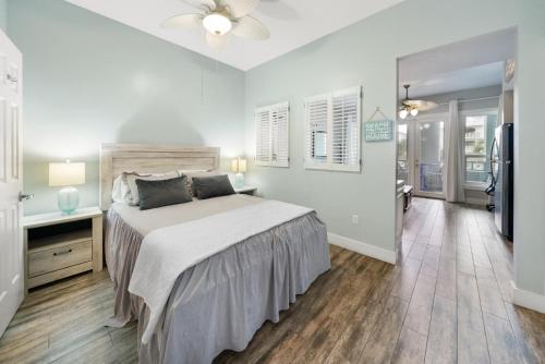 a bedroom with a bed and a ceiling fan at Lazy Daze at Gulf Place 208 in Santa Rosa Beach