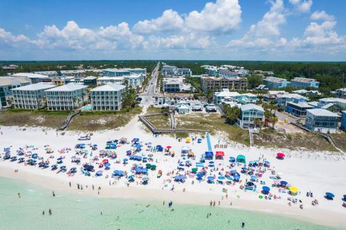 an aerial view of a beach with a group of people at Lazy Daze at Gulf Place 208 in Santa Rosa Beach